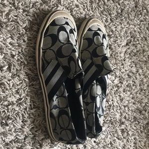 These are black and white hire coach shoes